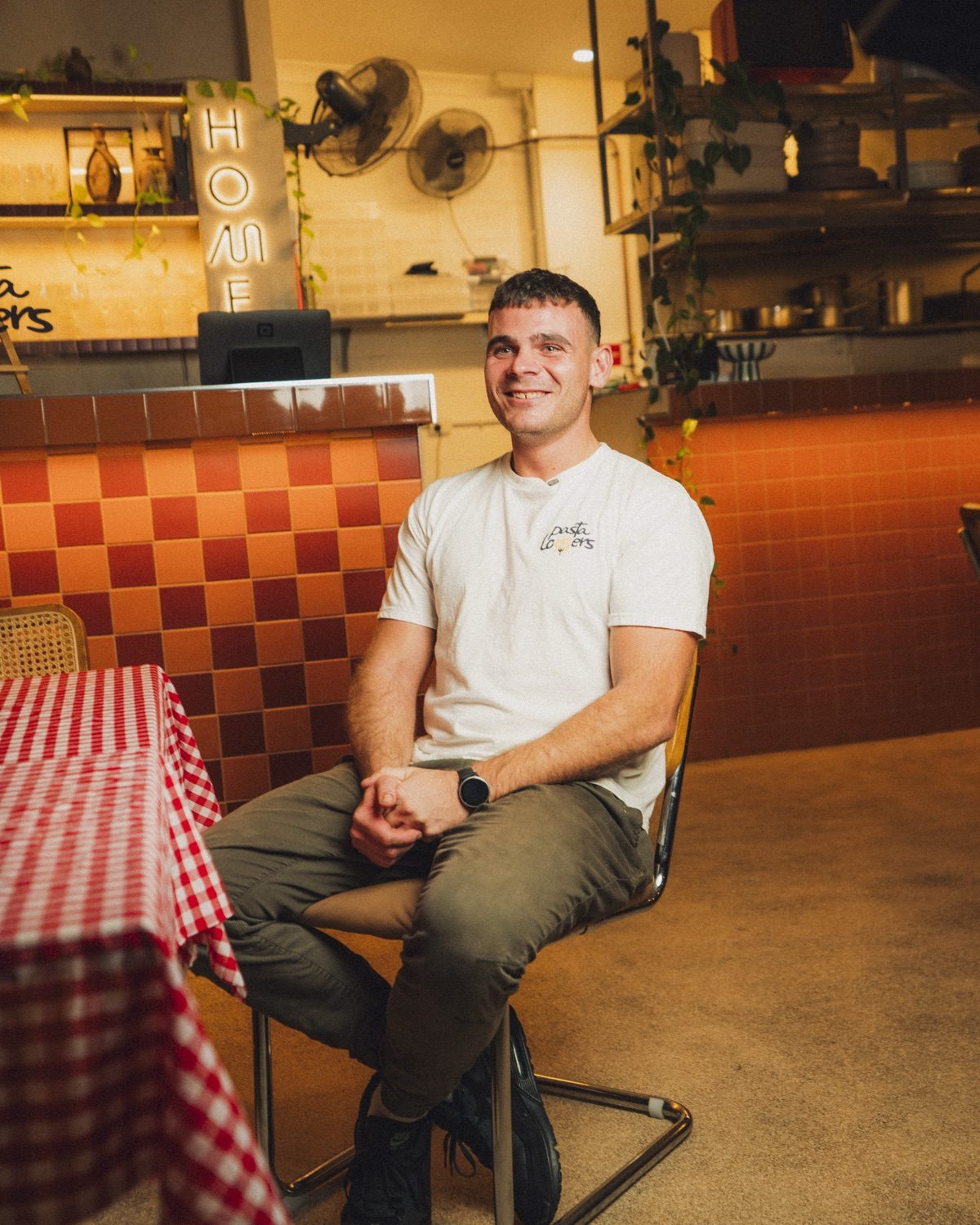The owner in the dining room of Pasta Lovers